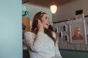Emotional bridal moment captured in candid photography.
