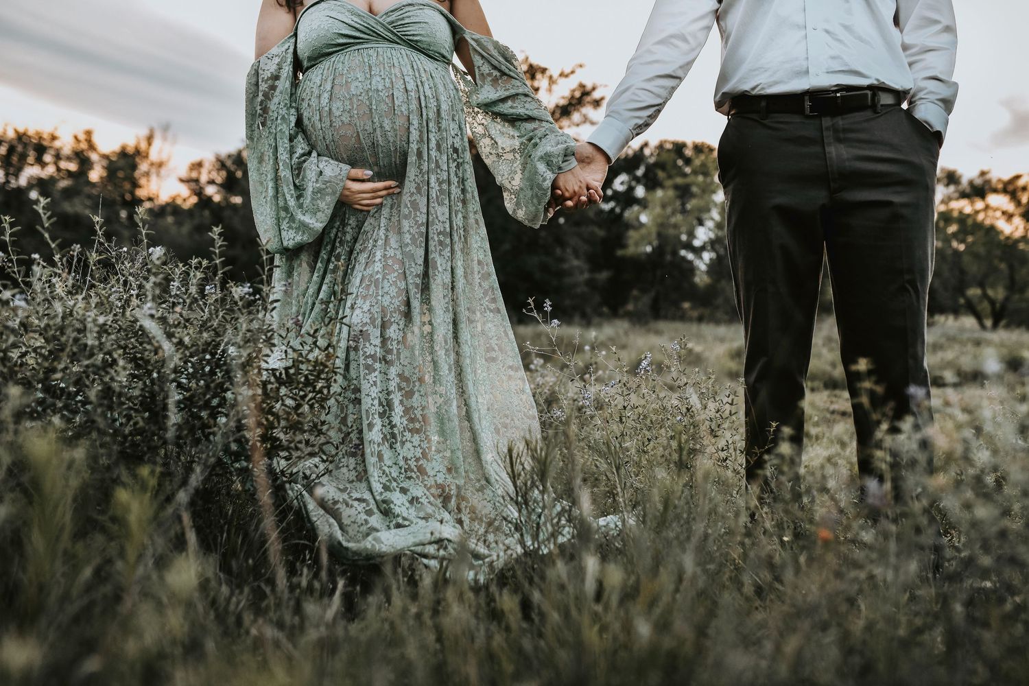 maternity photos in a golden grass field at sunset on lake grapevine by april pinto photography
