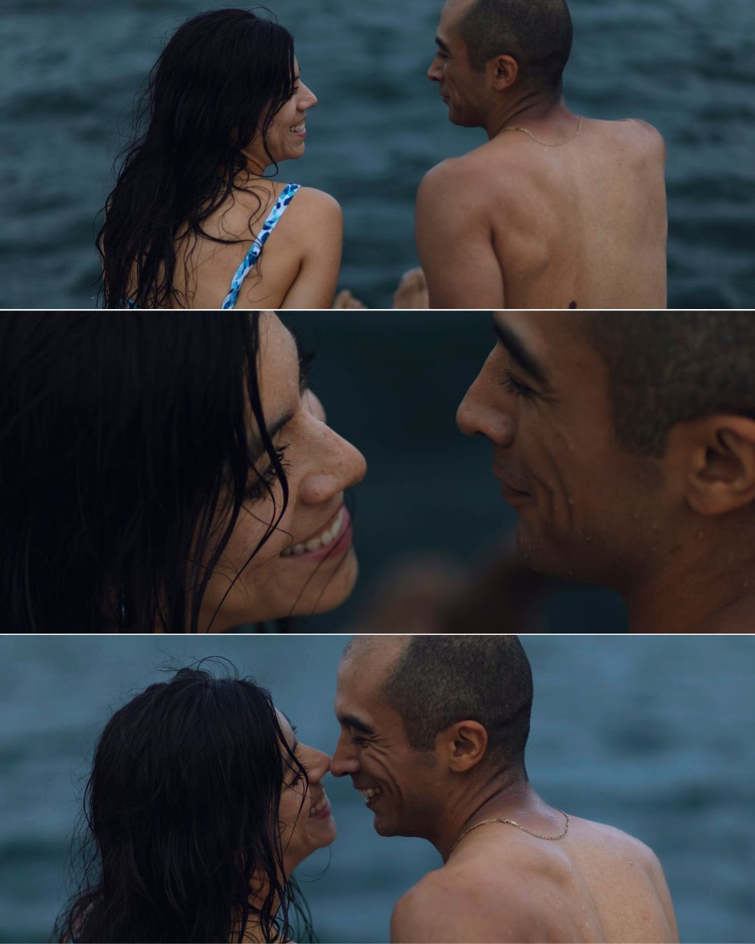 Couple swimming together in a lake at dusk, captured in an unposed, cinematic storytelling session. Laughing, intimate moment. Kingston Ont