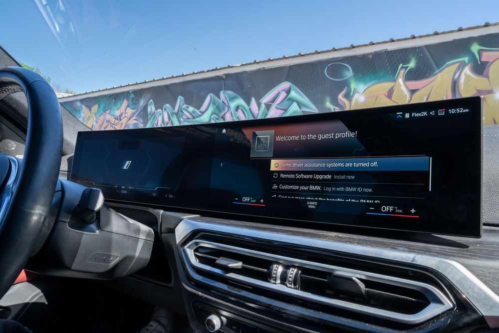 Interior view of a modern Honda Accord dashboard showing digital displays and ambient lighting.
