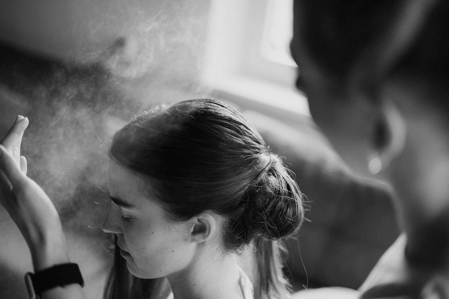 Black and white close-up of tender wedding moments.