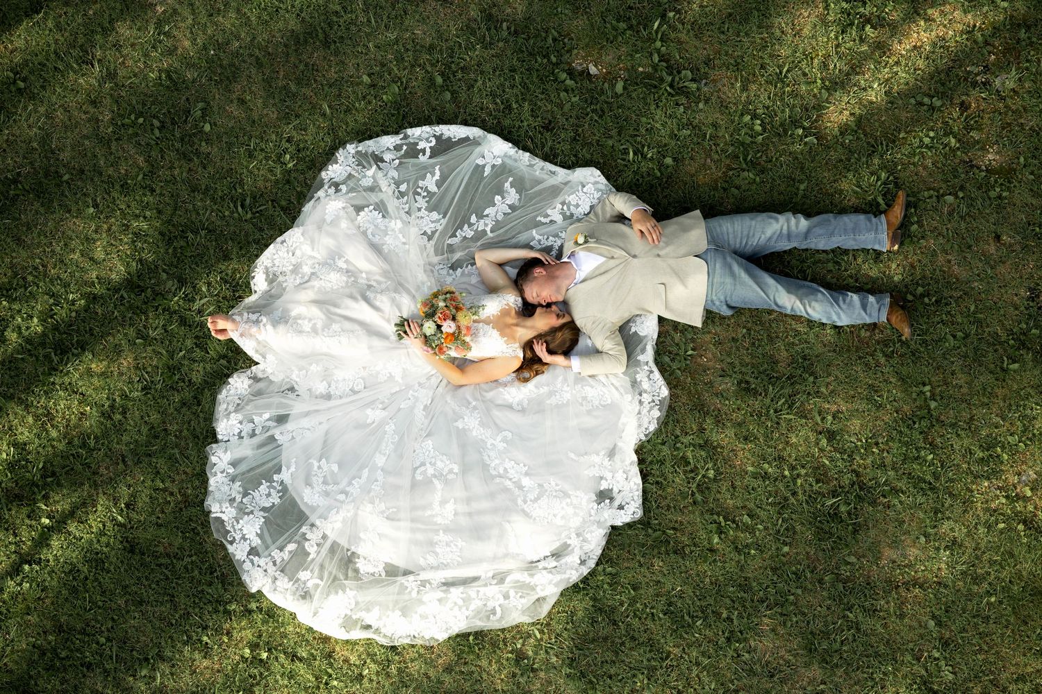 A wedding dress creates a flowing pattern as it spins in a sequence of outdoor photos on grass.