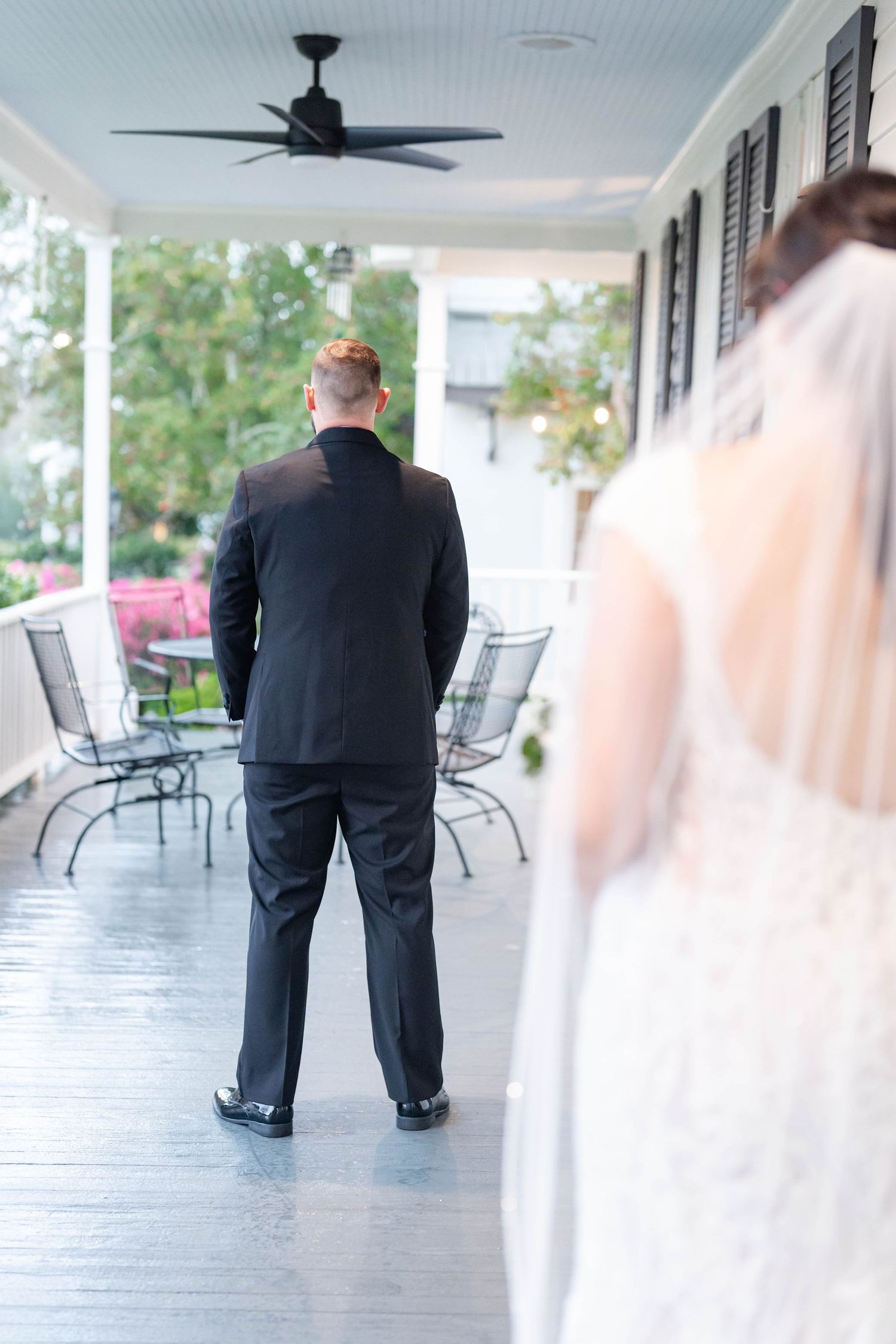 bride and groom first look at benedict's plantation in Mandeville, Louisiana