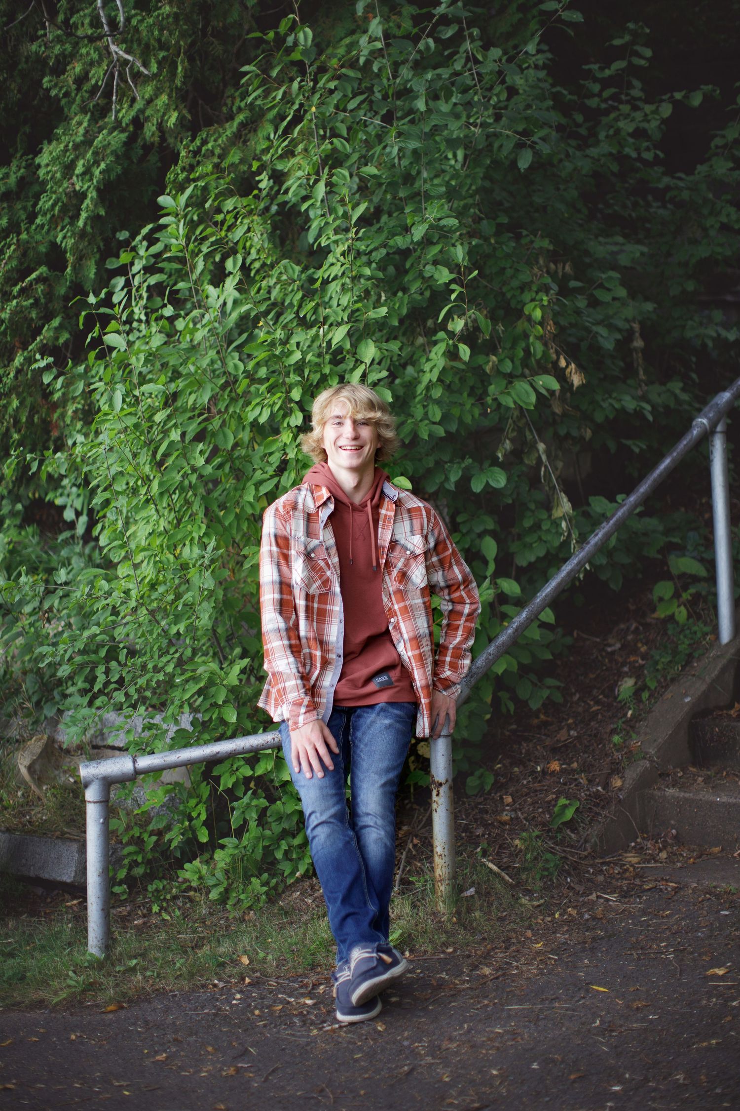 High school senior photos in Superior Wisconsin with natural greenery