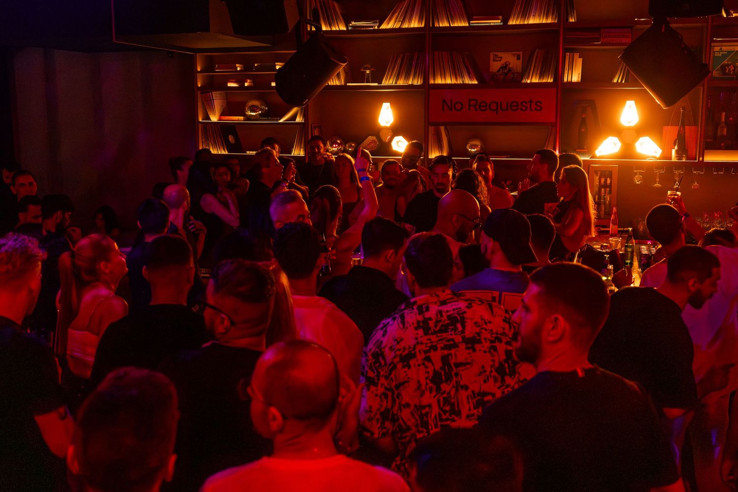 Packed crowd at indoor nightlife event