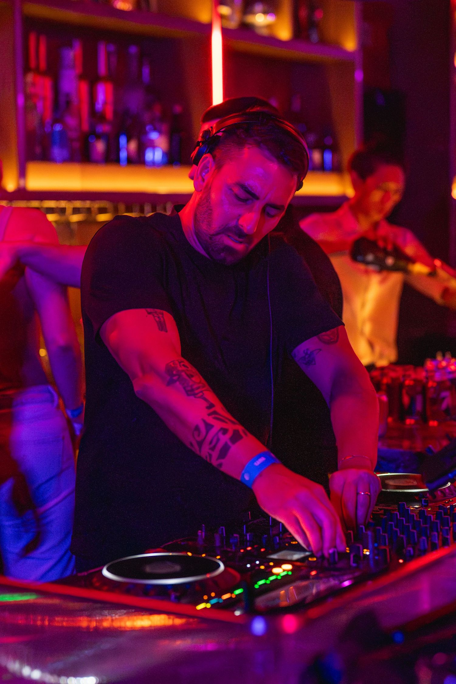 DJ mixing music at nightclub event in Dubai