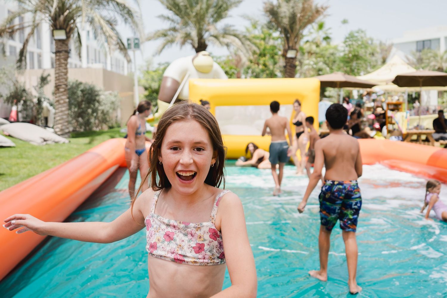 Children playing in a pool during a family event in Dubai