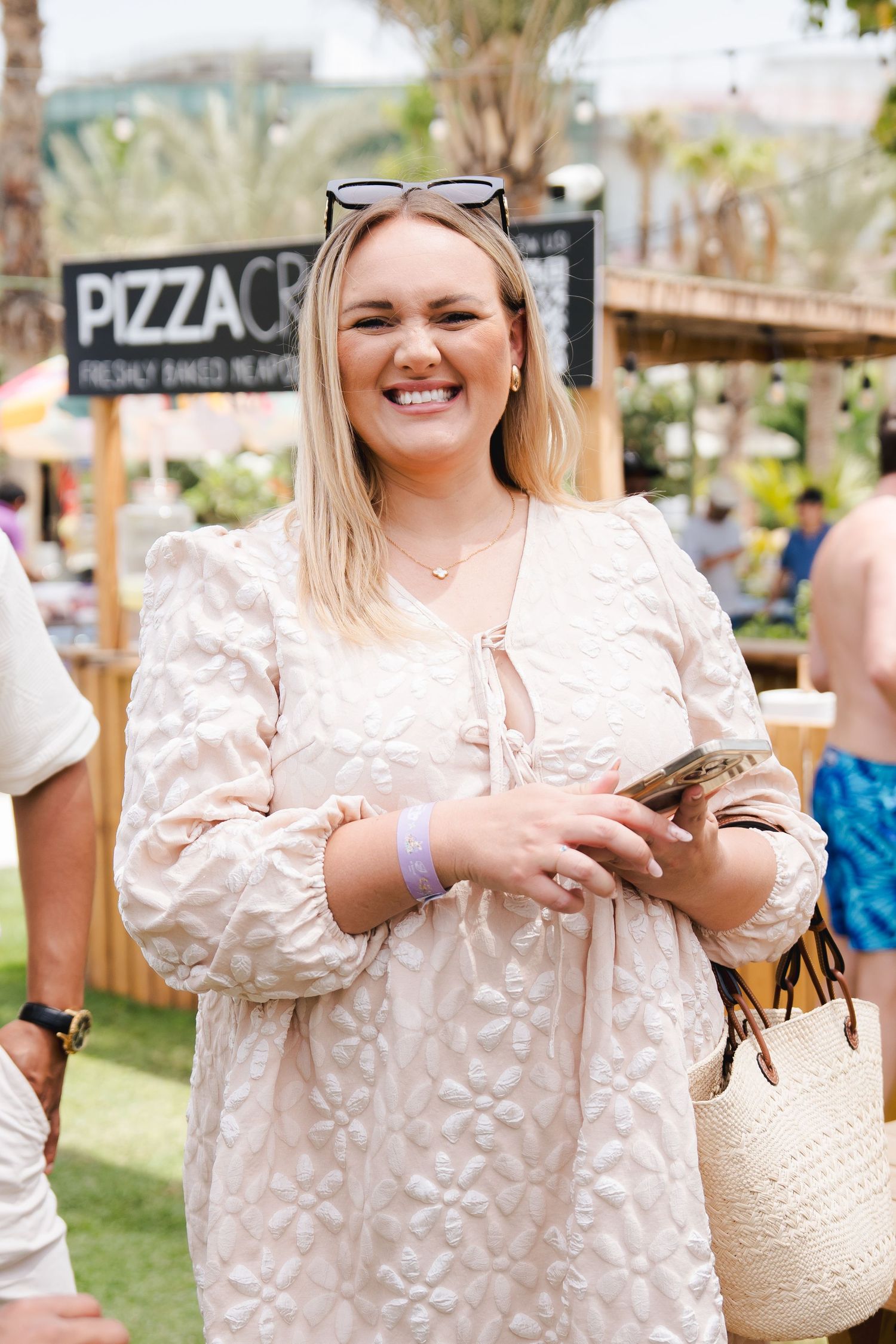 Guest smiling at a community family event photographed in Dubai