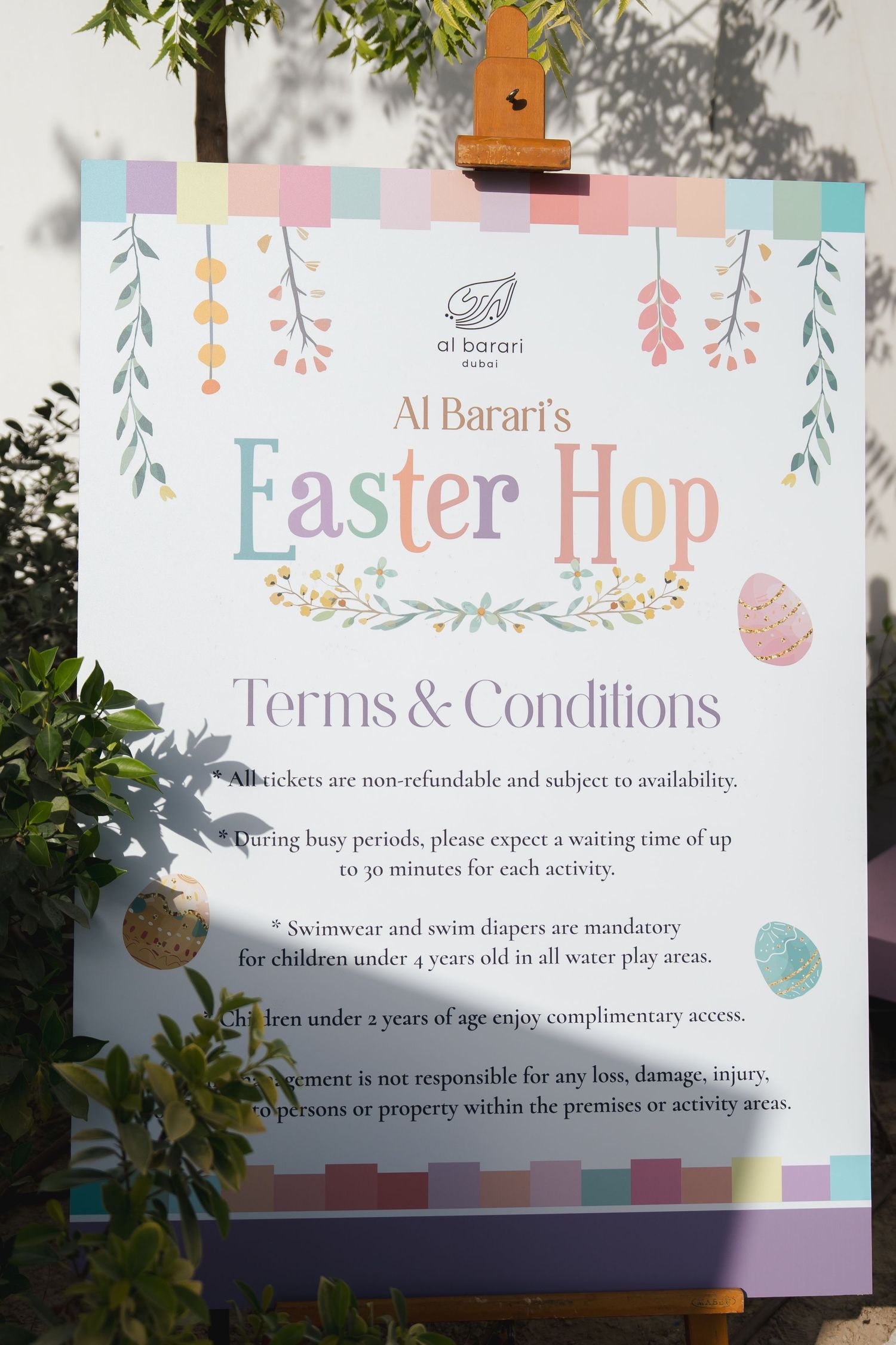 Easter Hop event sign photographed during a community celebration in Dubai