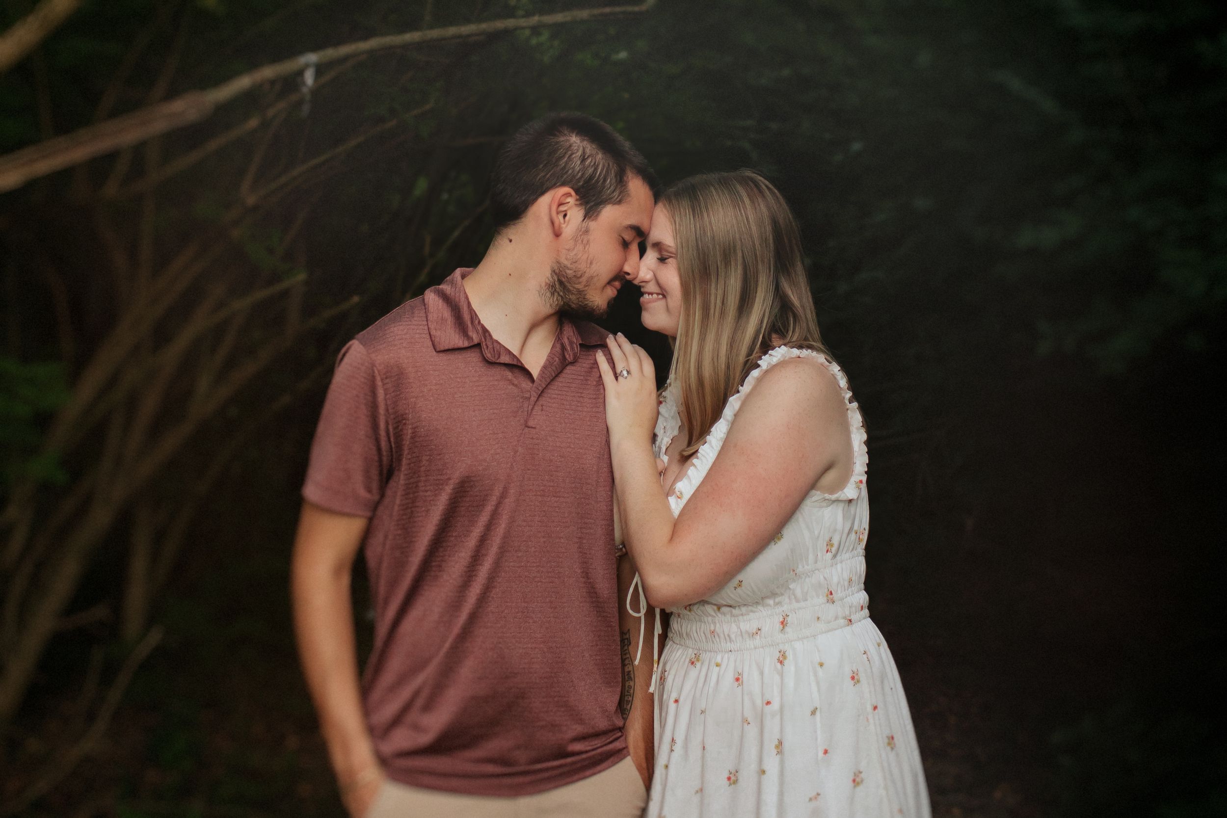 A romantic couple in casual attire shares tender moments in an outdoor photo collage at dusk.