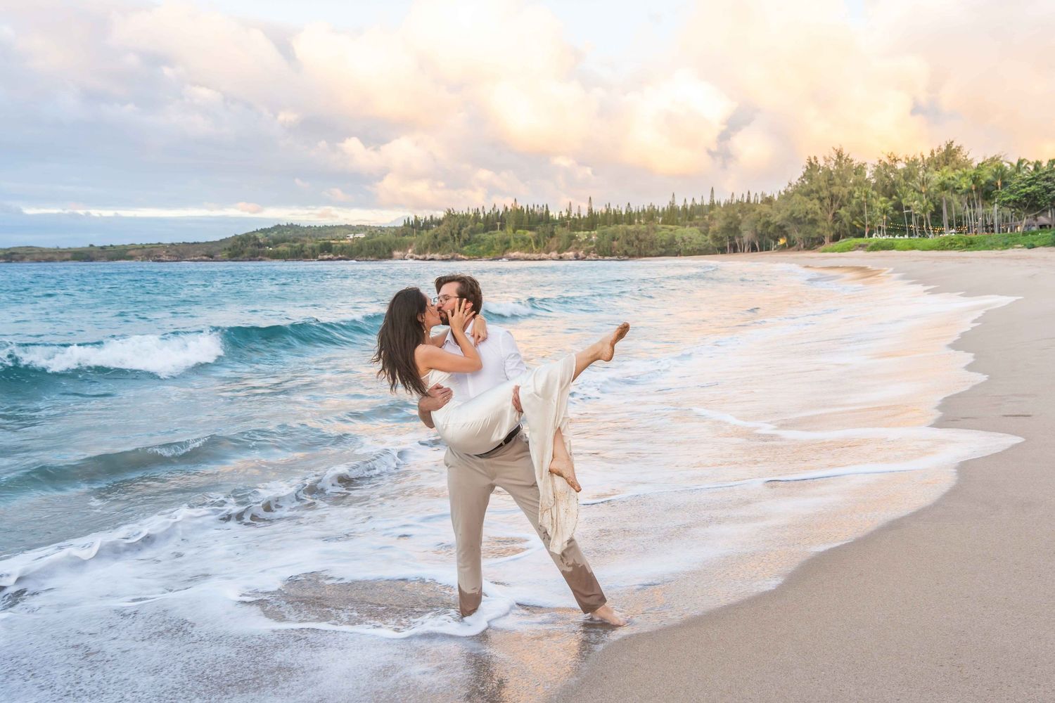 Maui couple engagement photographer photo against beautiful Maui beach sunset by ohwowfotos.