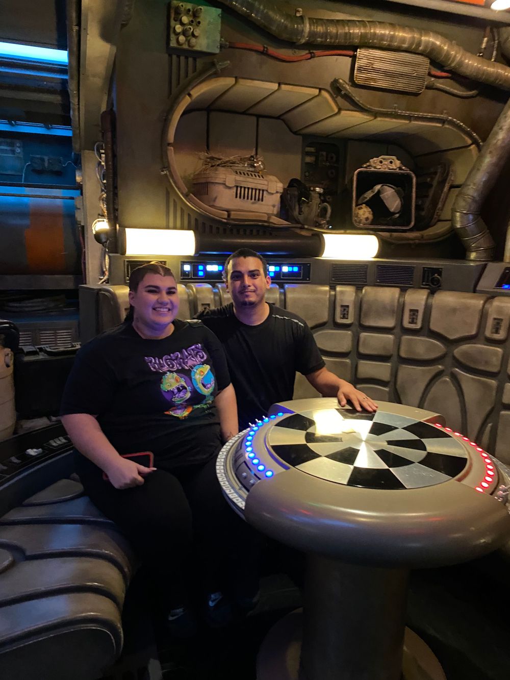 Family trip to Galaxy’s Edge at Star Wars: Disney's Hollywood Studios experience with kids at themed table