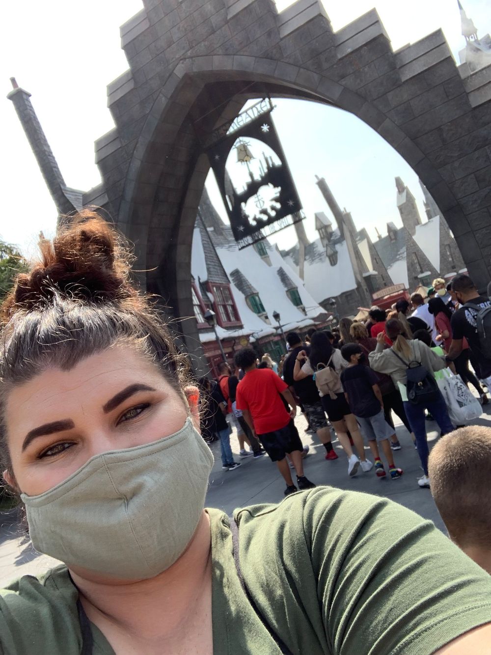 Adventure photo in front of The Wizarding World arch at Universal Studios Orlando