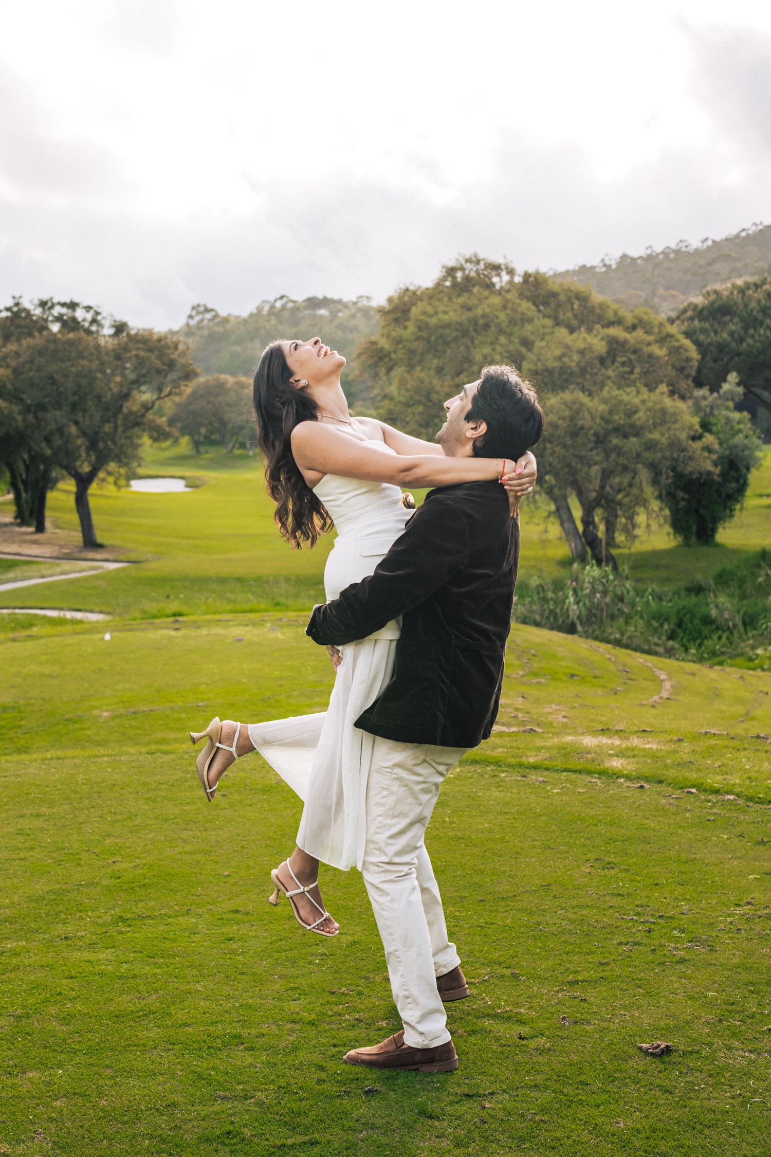 Romantic pre-wedding shoot in Sintra, Portugal, with an Indian couple exploring Penha Longa Resort. By a destination wedding Photographer