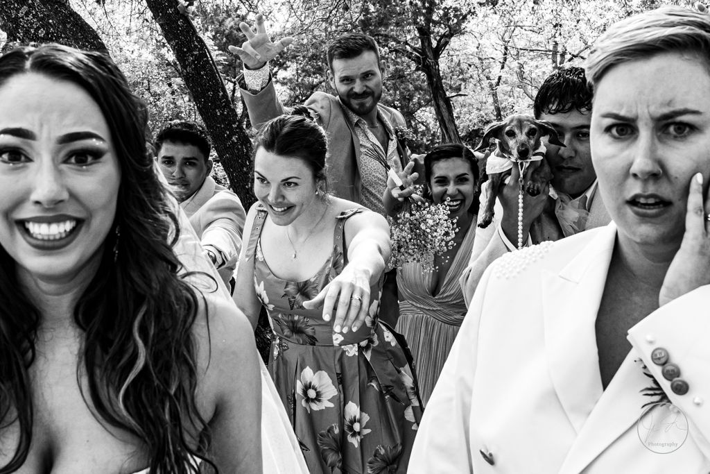 Wedding photo of bride and groom being announced after the ceremony