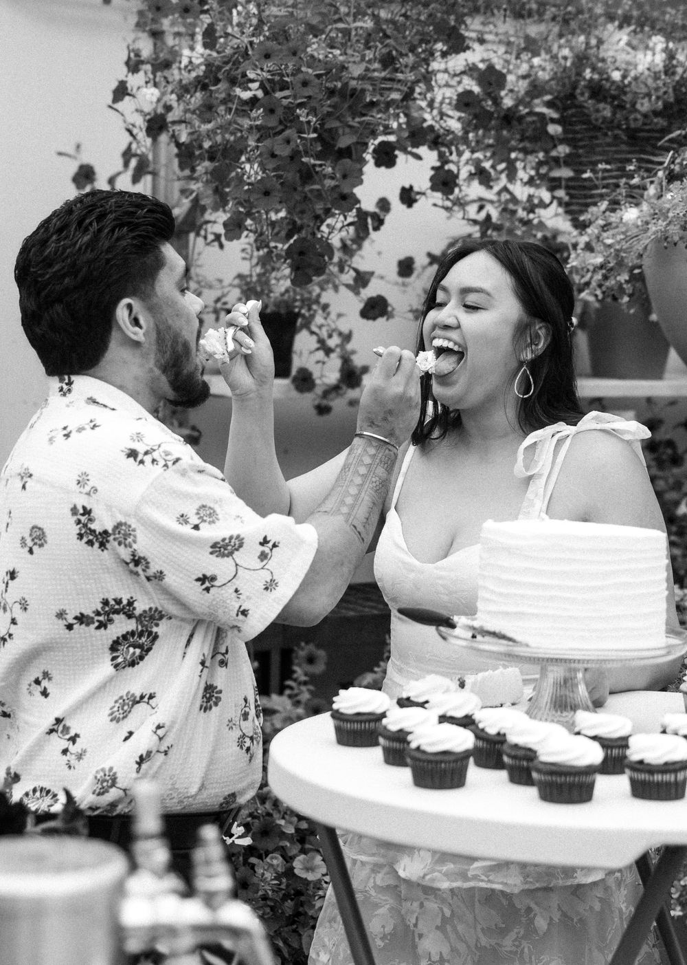 A sequence of candid moments showing two people playfully feeding each other cupcakes at a celebration.
