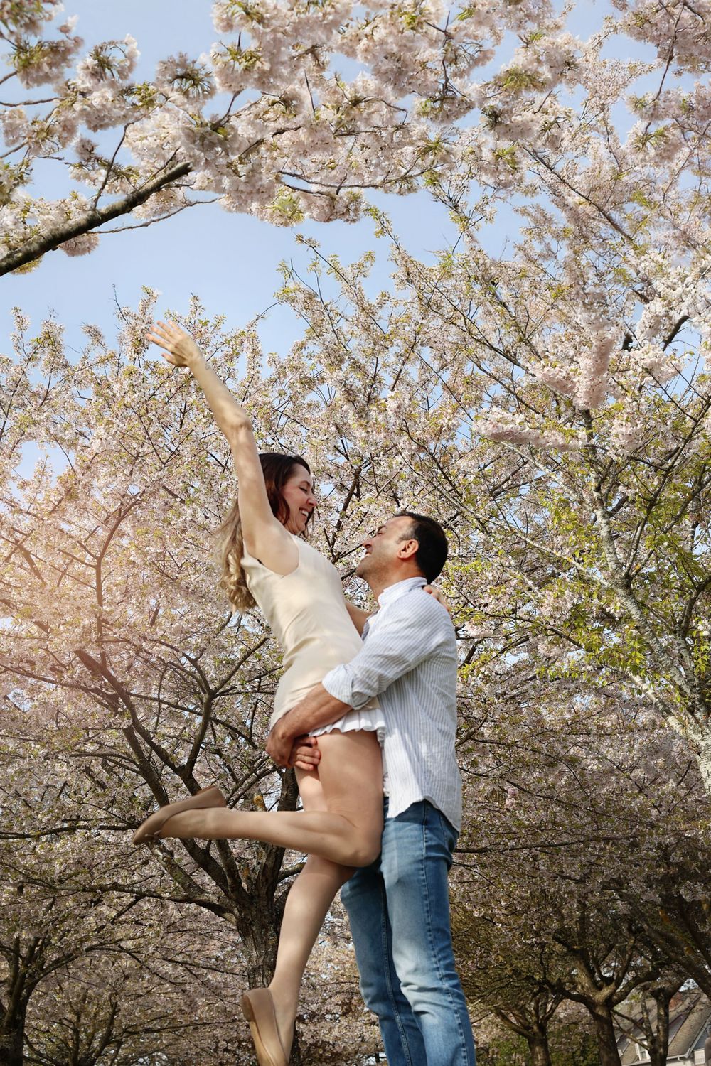 Vancouver anniversary photography with cherry blossoms in bloom