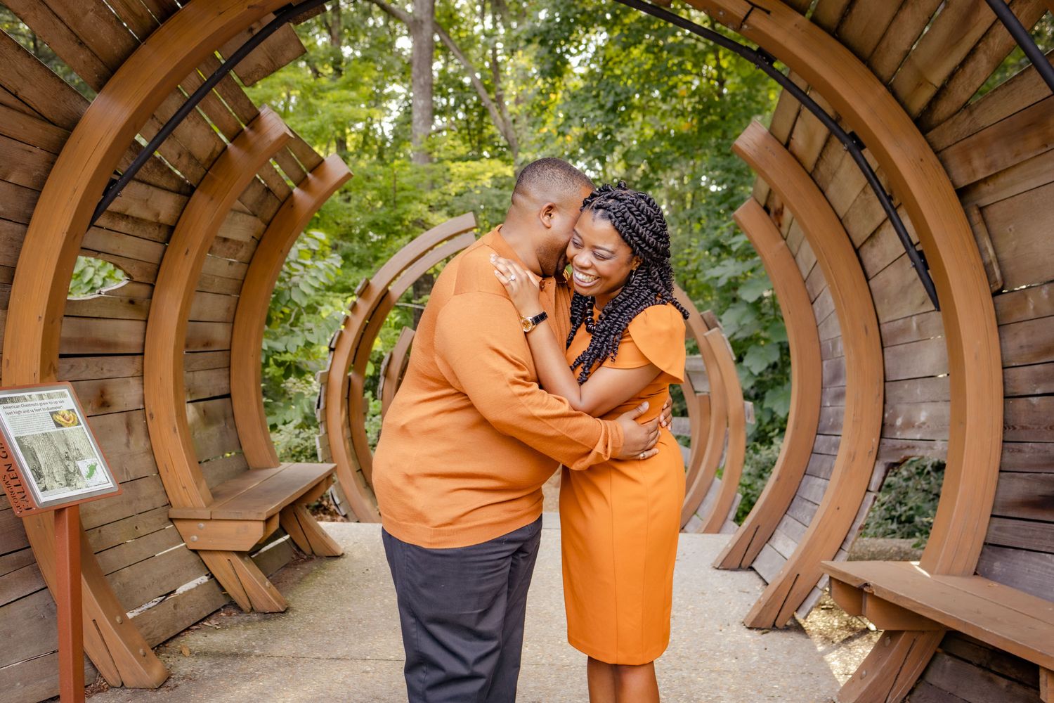 Outdoor engagement photos under wooden archways in a natural setting.