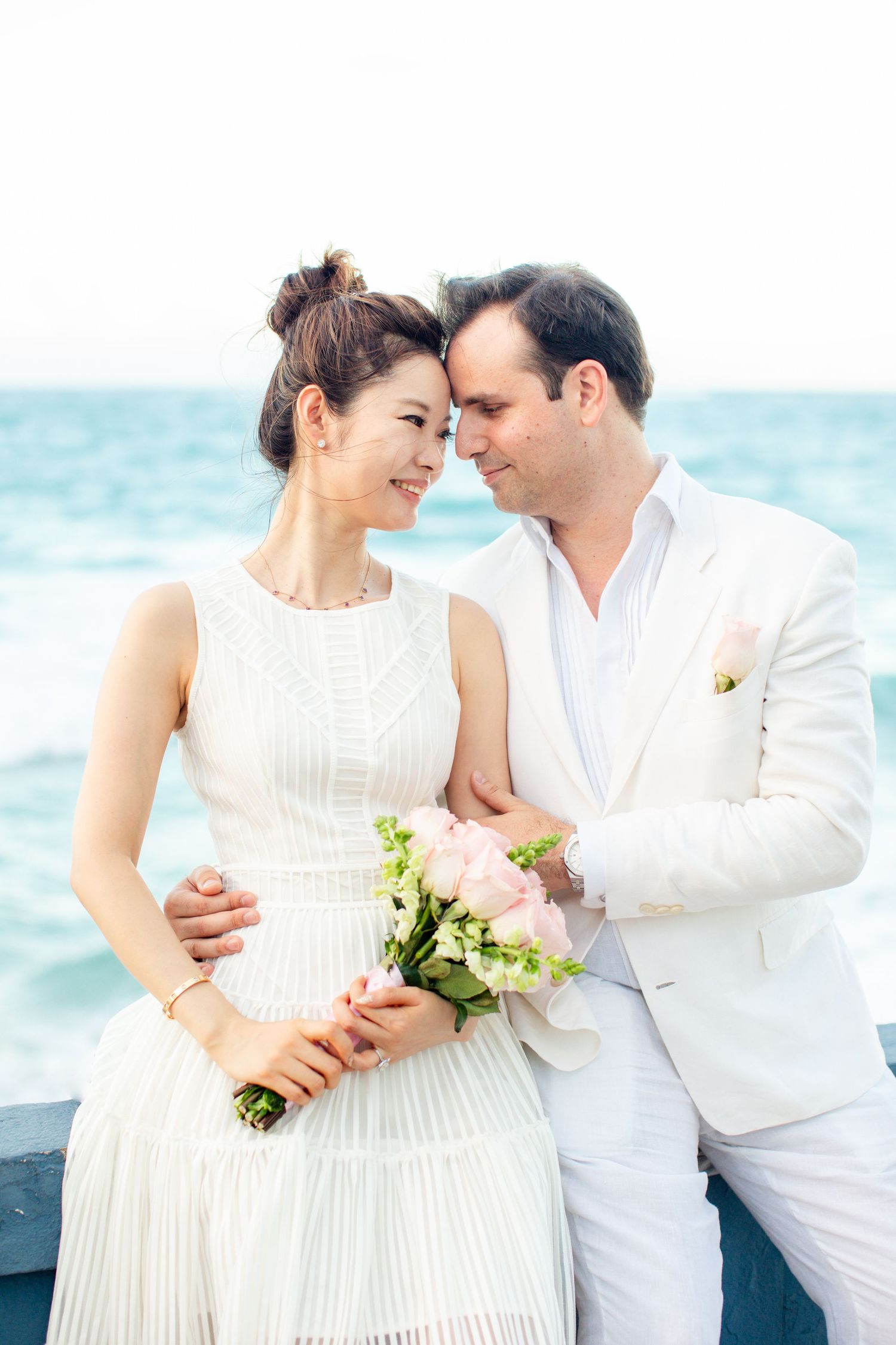 Bride and groom at the beach. Micro wedding in San Juan, Puerto Rico.