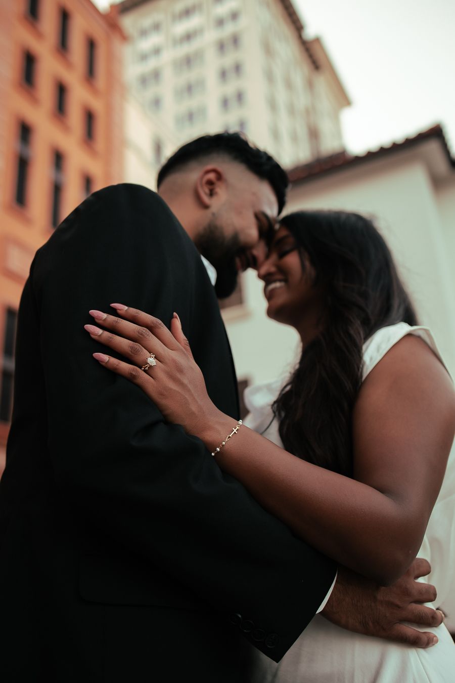 Cinematic South Florida engagement portrait with city backdrop, Instagram love story perfect for Pinterest couples by MannyPortraits.