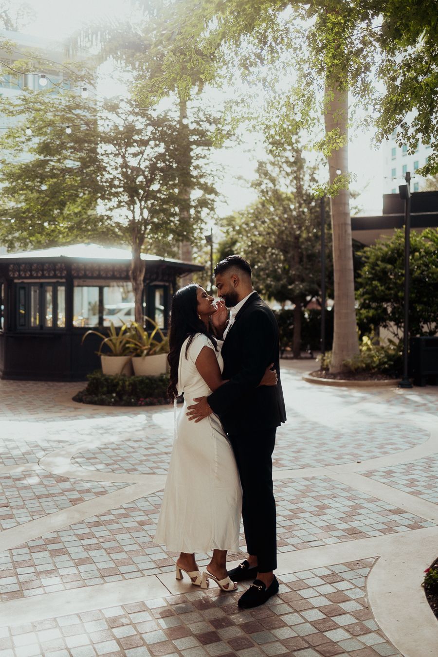 Editorial Miami couple session in bright plaza, Pinterest wedding inspo and Instagram engagement portrait by MannyPortraits.