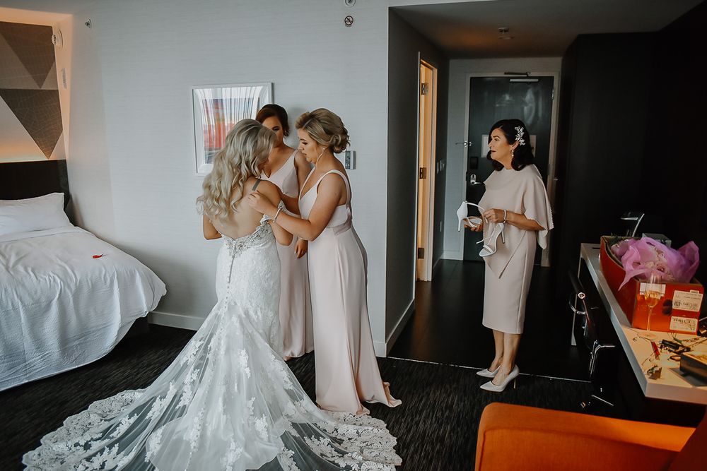 A series of candid moments during wedding preparations and getting ready shots in black and white photography style.