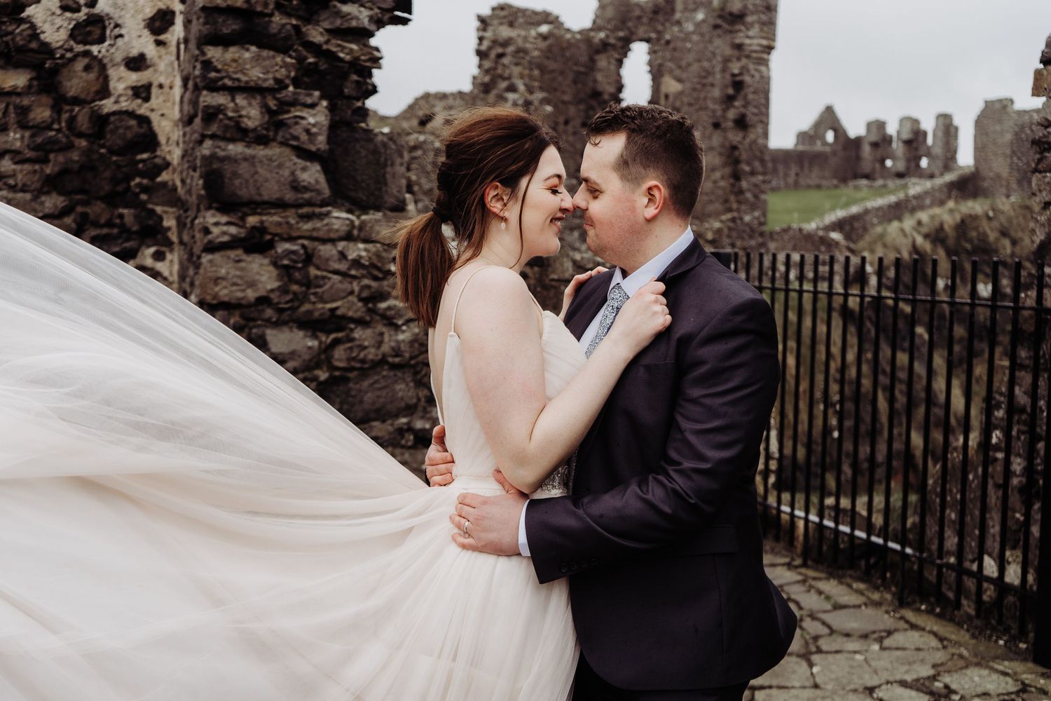 Stunning wedding portraits in Dunluce Castle ruins, Northern Ireland