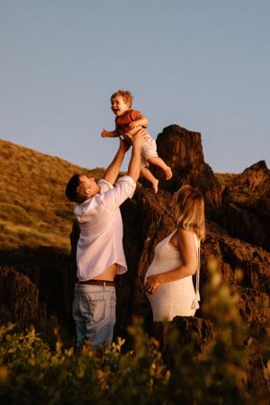 A fun family, maternity photography session at sunrise on the beach in Point Samson, WA