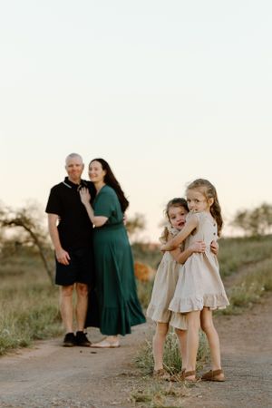 A fun family portrait at sunrise on a dirt track in Cossack, WA