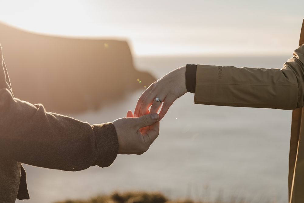 engagement photo session at Cliffs of Moher, Ireland during sunset