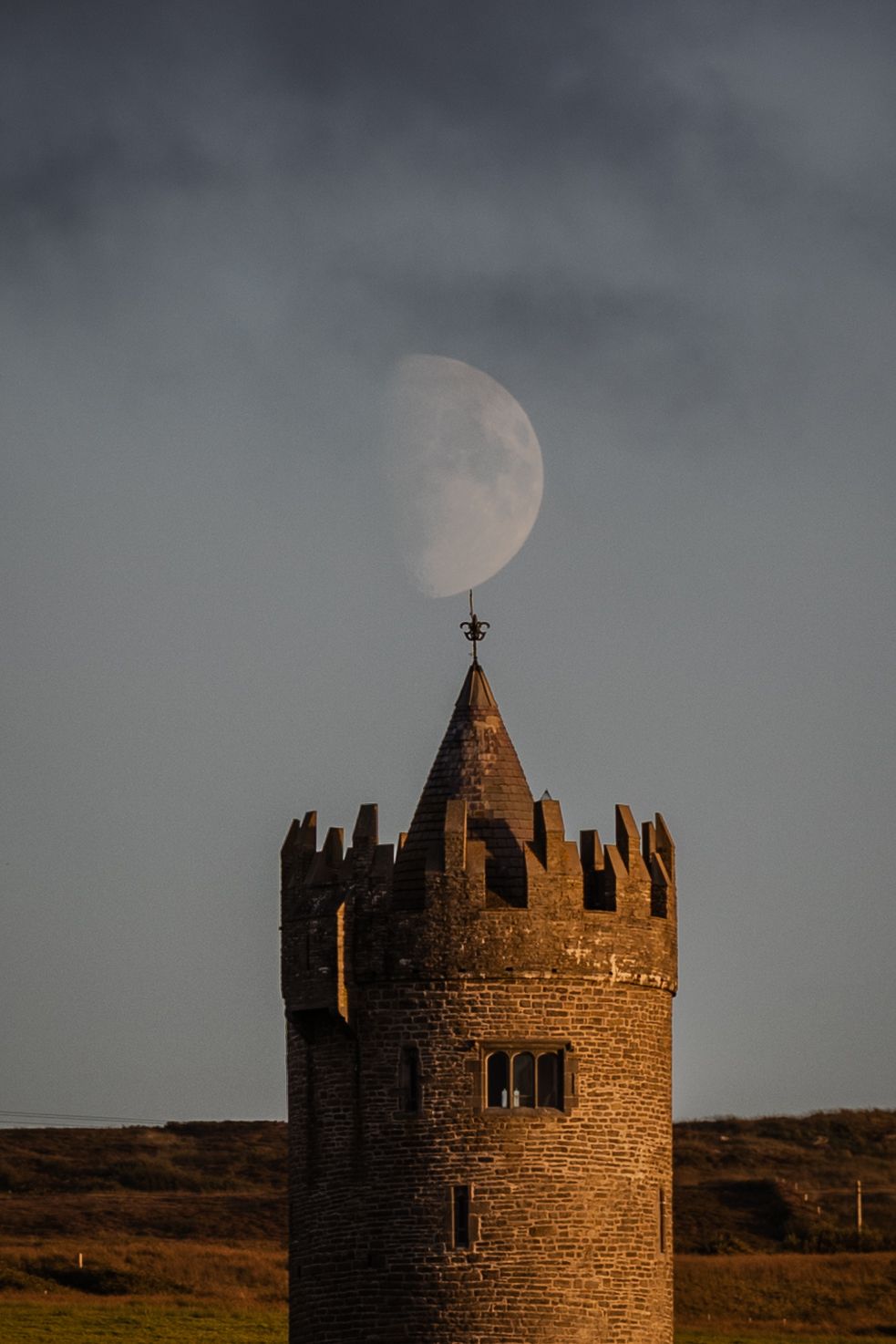 Doonagore castle and the moon