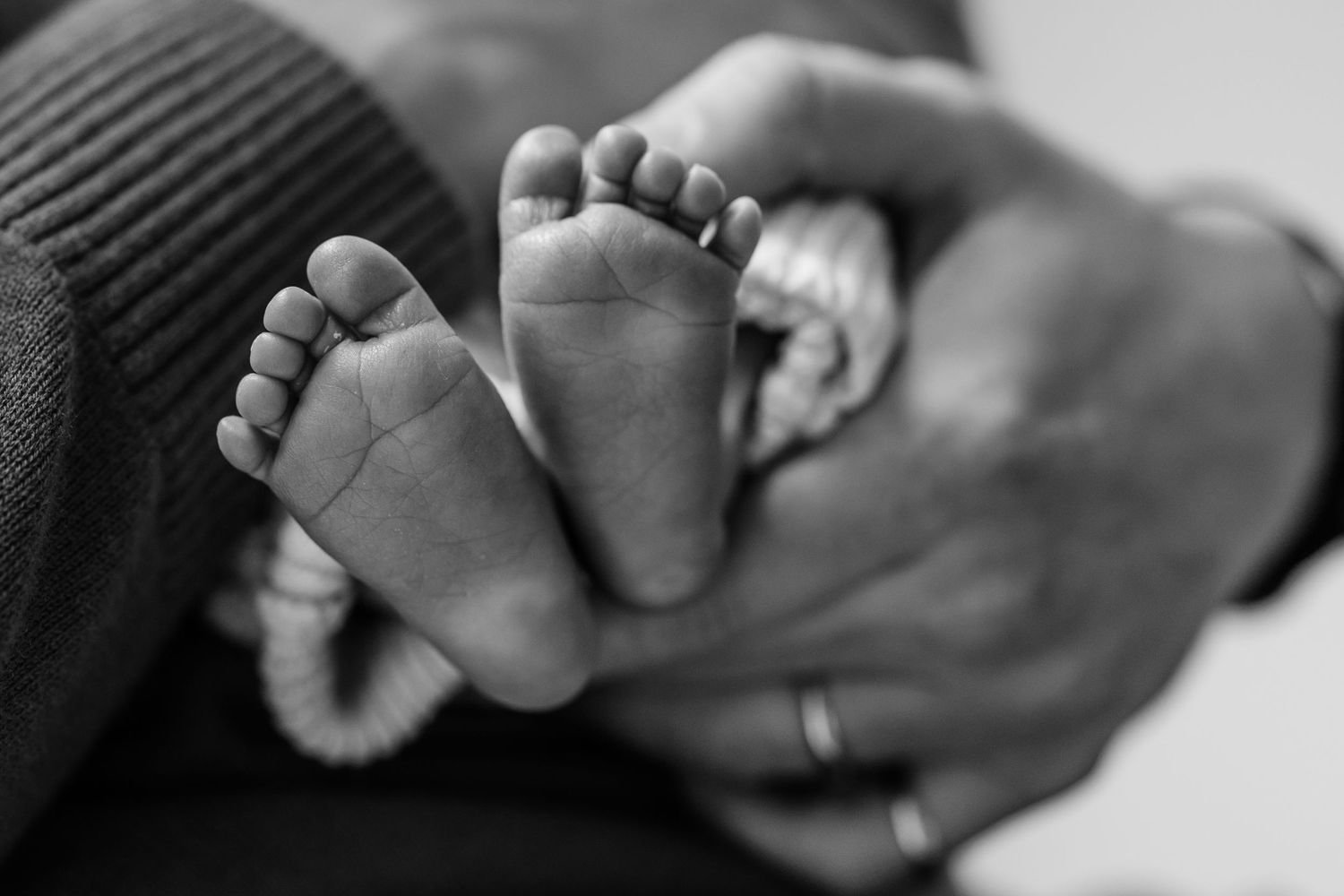 baby's feet in black and white