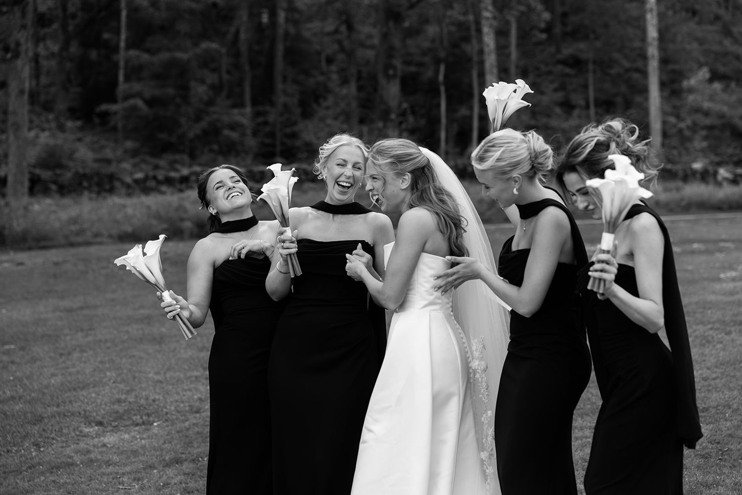 A black and white photo series shows wedding party members dancing and celebrating together at an outdoor reception.