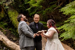 Couple eloping with officiant at Proxy Falls in the Willamette National Forest. PNW Elopement Photographer.