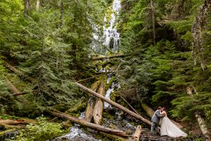 Couple eloping with officiant at Proxy Falls in the Willamette National Forest. PNW Elopement Photographer.