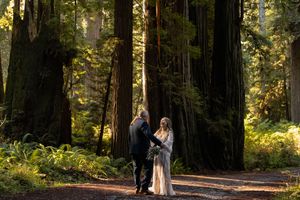Brides first look with her dad at her intimate elopement in the California Redwoods