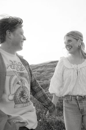 A black and white portrait sequence shows a couple in vintage-style casual clothing.