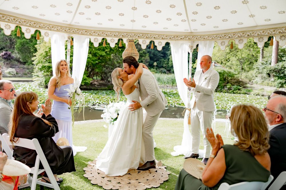 A series of outdoor wedding ceremony photos showing couples and guests celebrating under white tents in a garden setting.