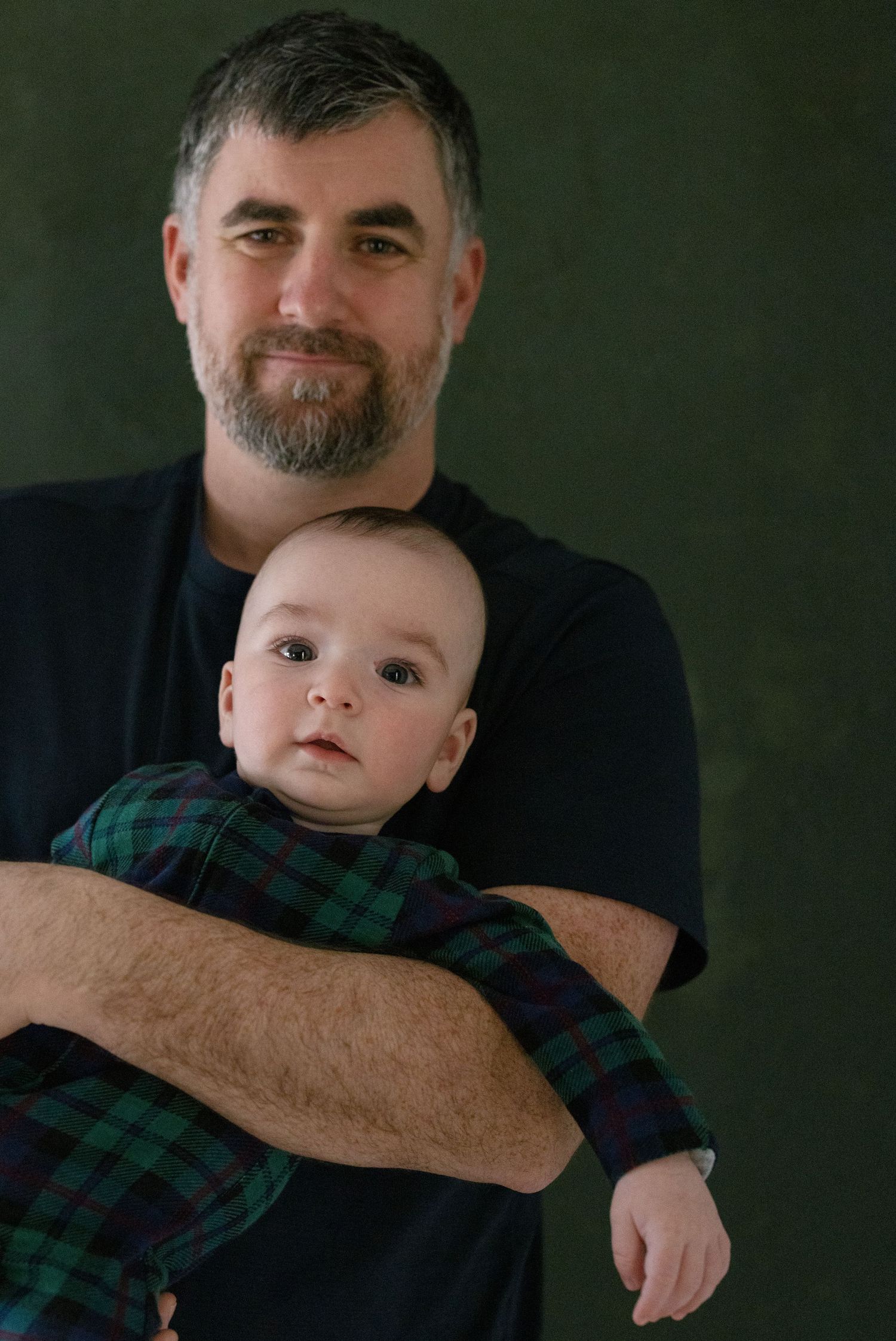 Gentle parental moments captured in series against dark background.