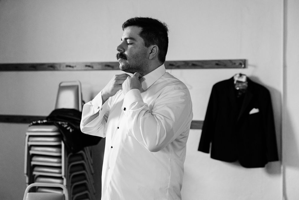 Black and white candid sequence shows emotional reactions during a wedding celebration.