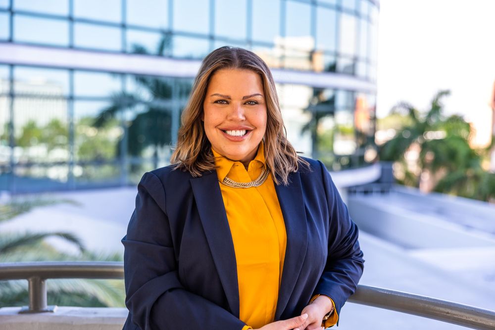Sarasota Photographer Real Estate Editorial High End Photography Professional Headshots Action Shots Woman headshot Warm
