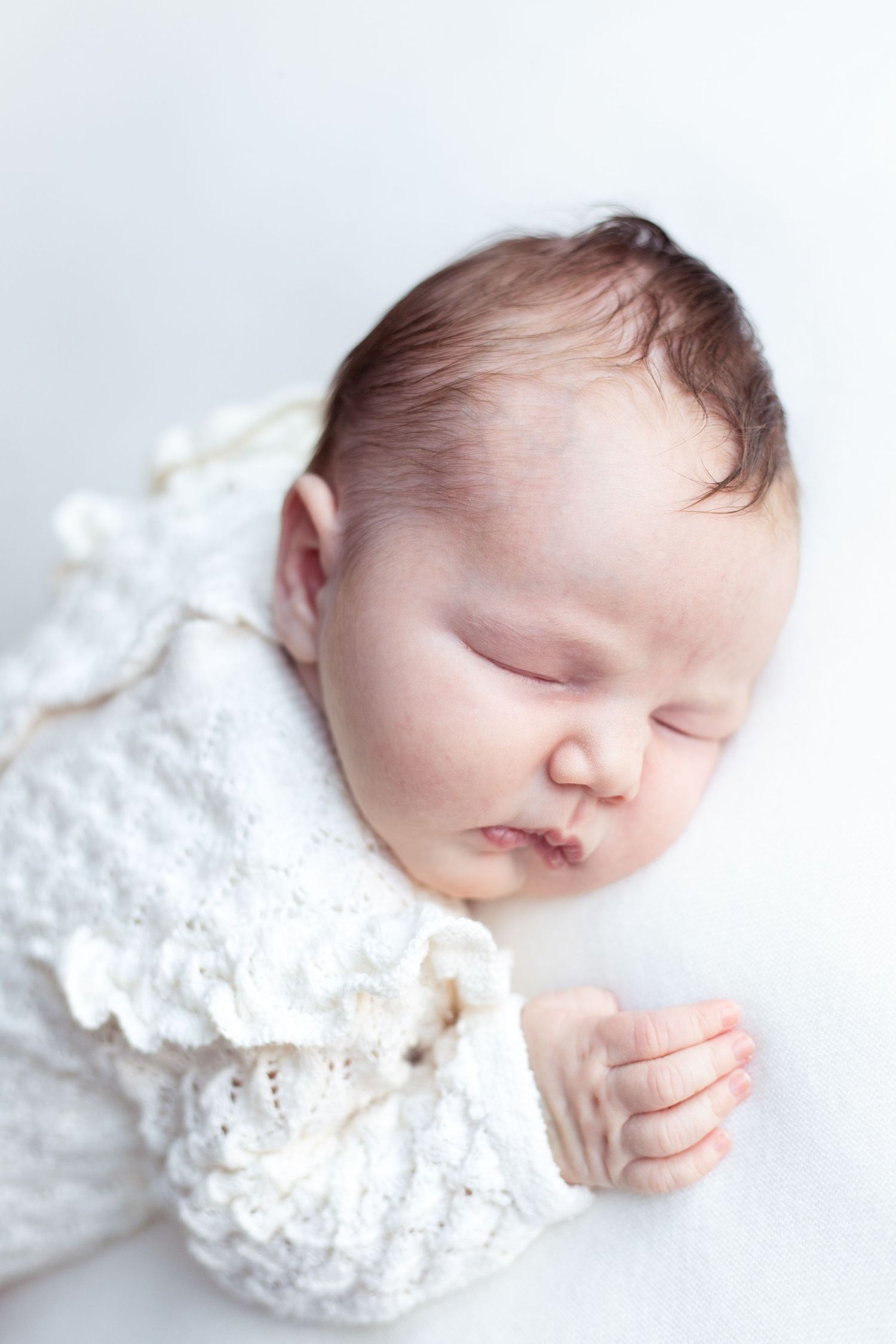Professional in-home newborn photoshoot captured in Stevenage, Hertfordshire. Available throughout Hertfordshire for baby photography
