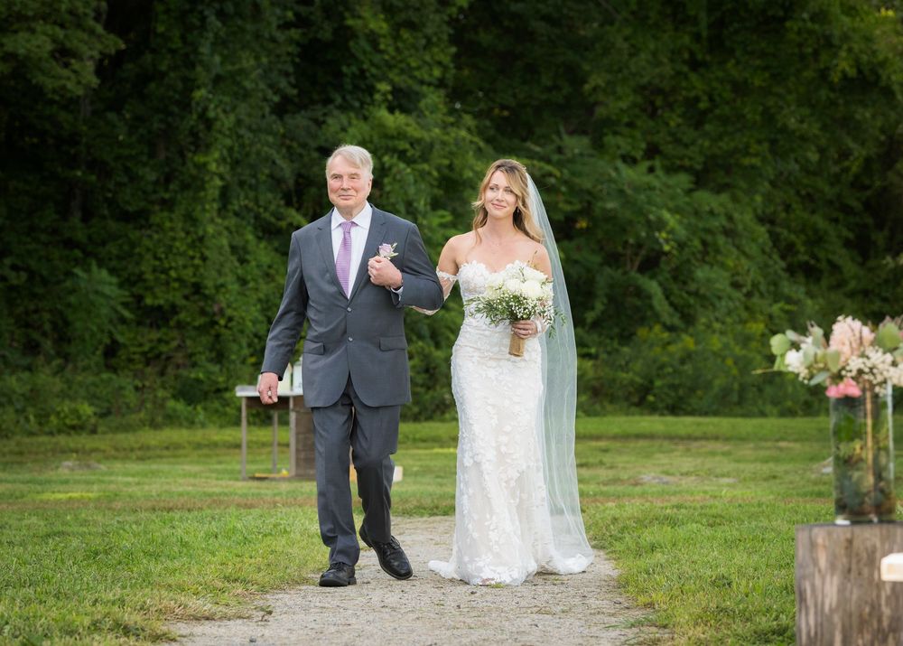 Collection of candid outdoor wedding photos showing a bridal party walking and posing in a lush green garden setting.