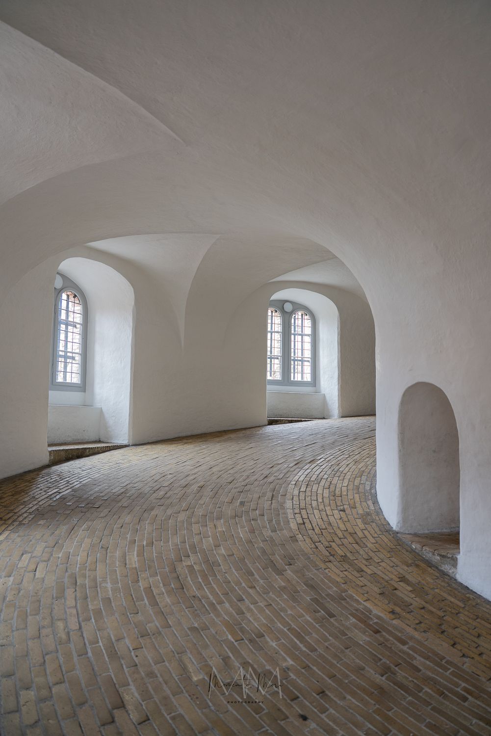The warm, neutral and very curvy archetecture of the Round Tower in Copenhagen