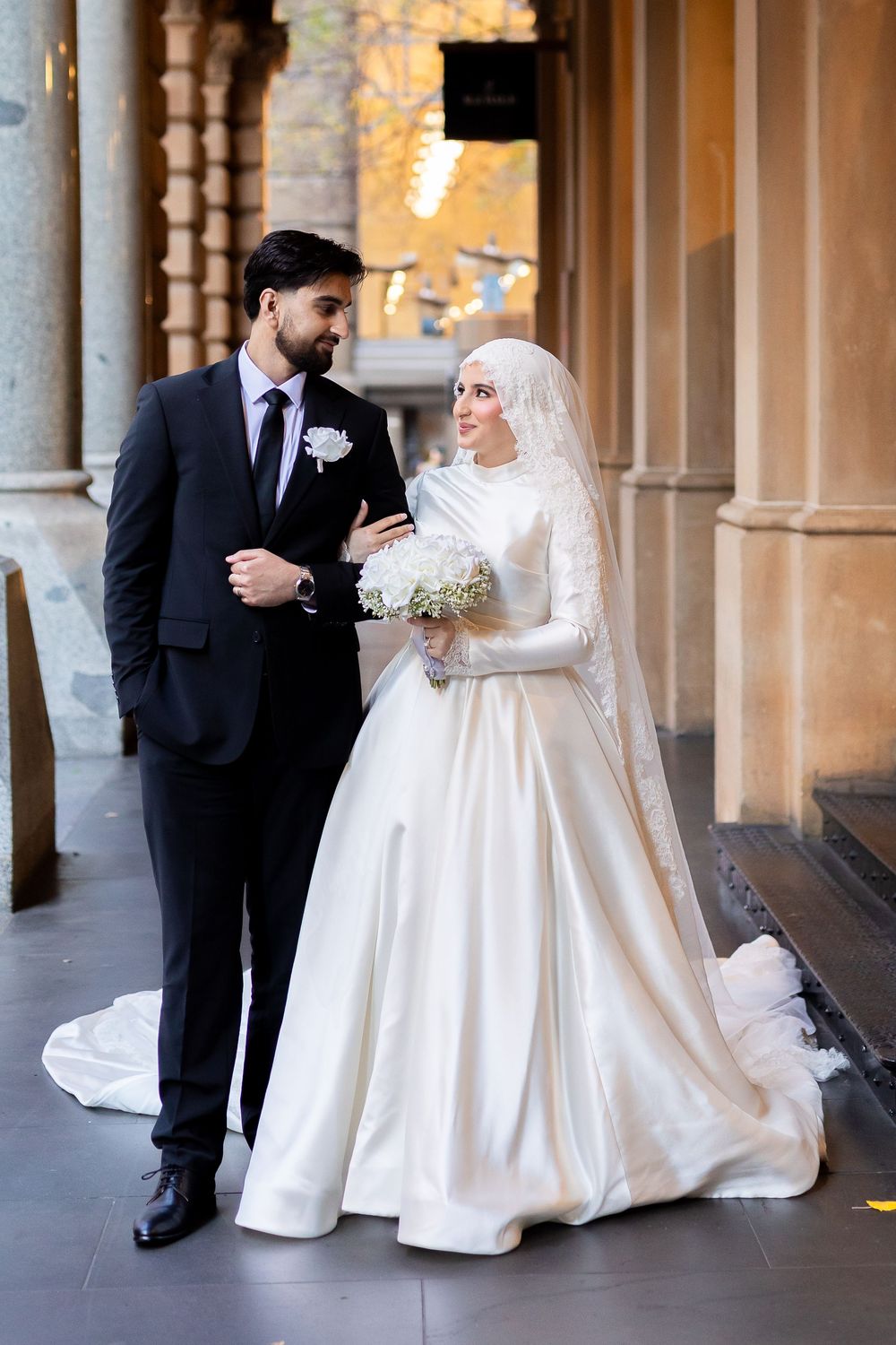 Creative and Natural candid portrait of newlyweds  and smiling after their wedding ceremony in Sydney