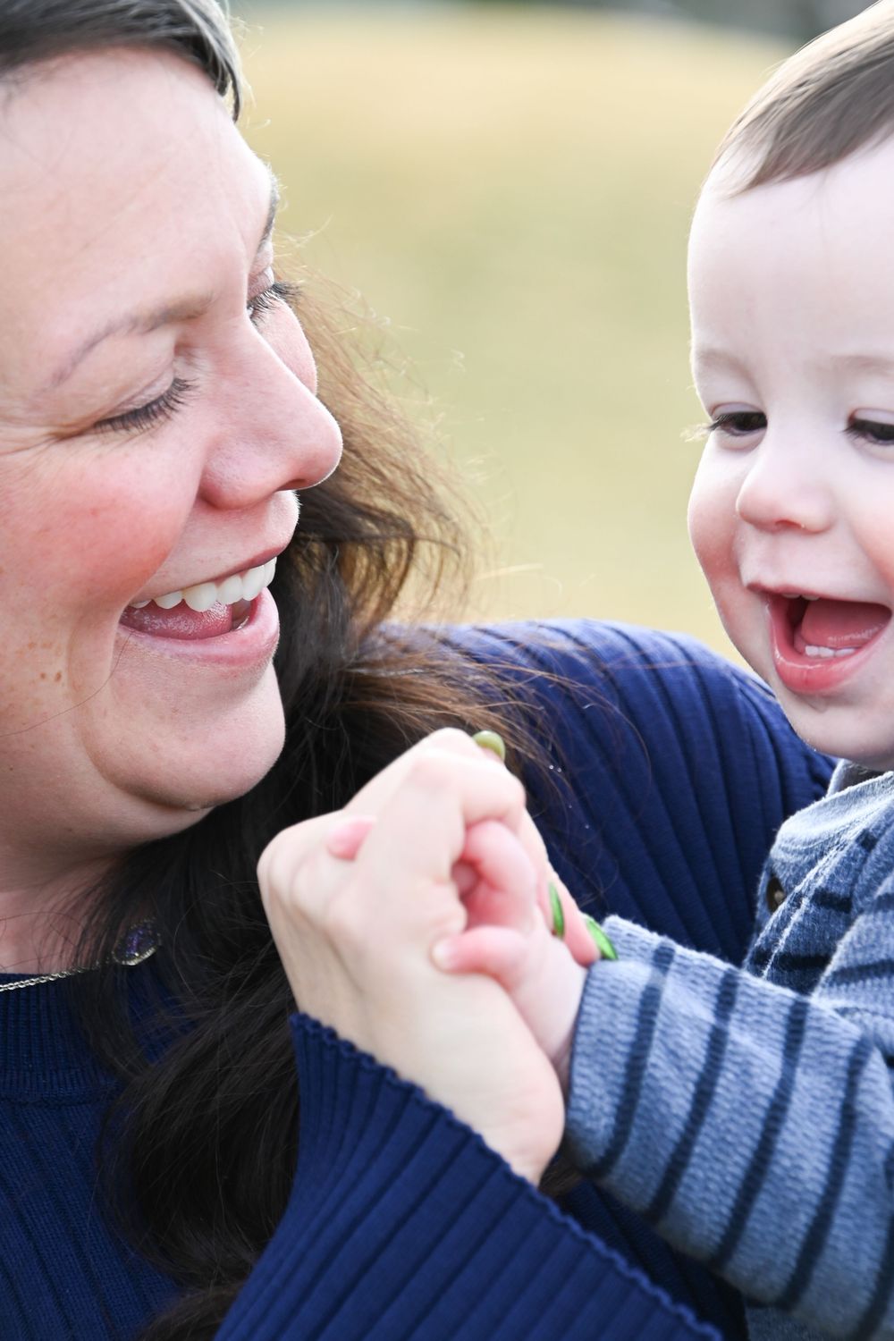 Close-up series showing a joyful expression and laughter unfold in sequence across several frames.