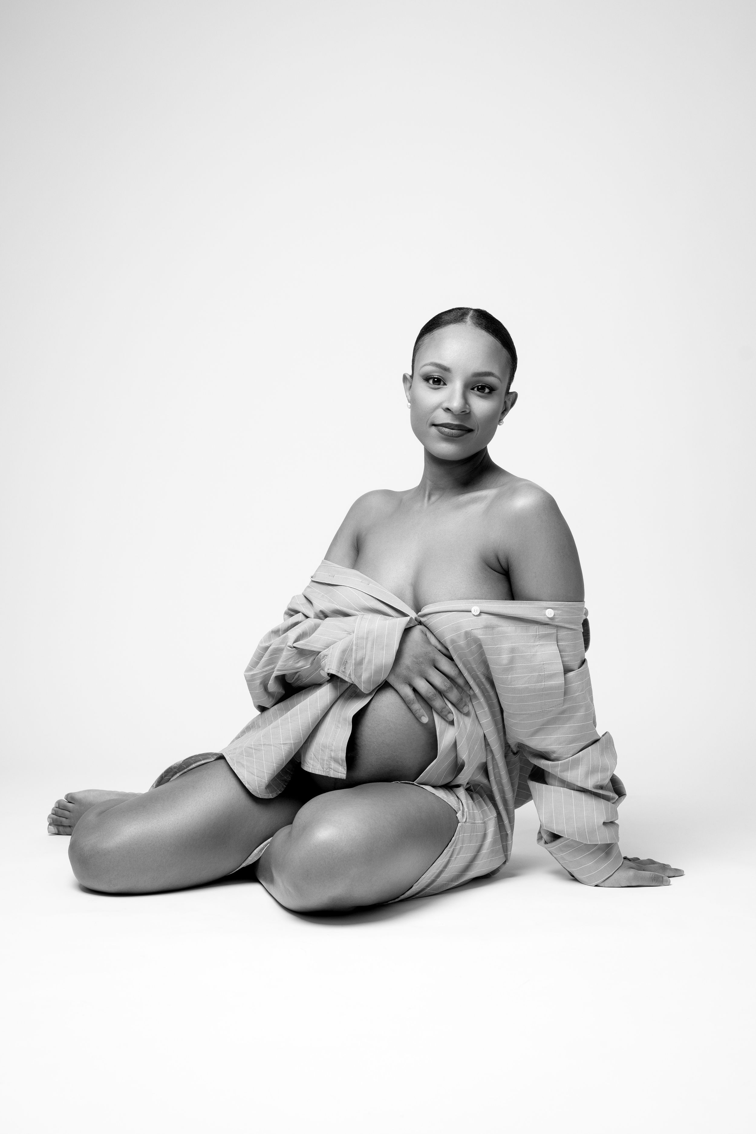 A collection of minimalist black and white editorial portrait photos showing a subject in various artistic poses.