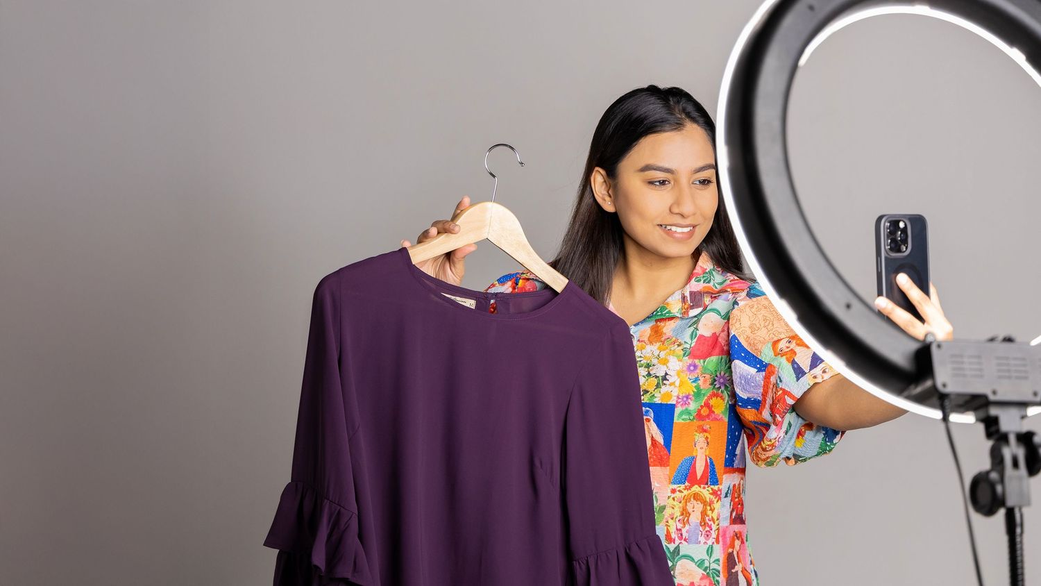 Collage showing someone posing with ring light and colourful clothing against a grey studio backdrop.