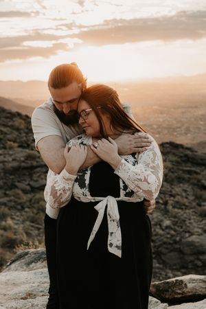 Authentic engagement moments captured in the desert landscape of Phoenix Arizona.