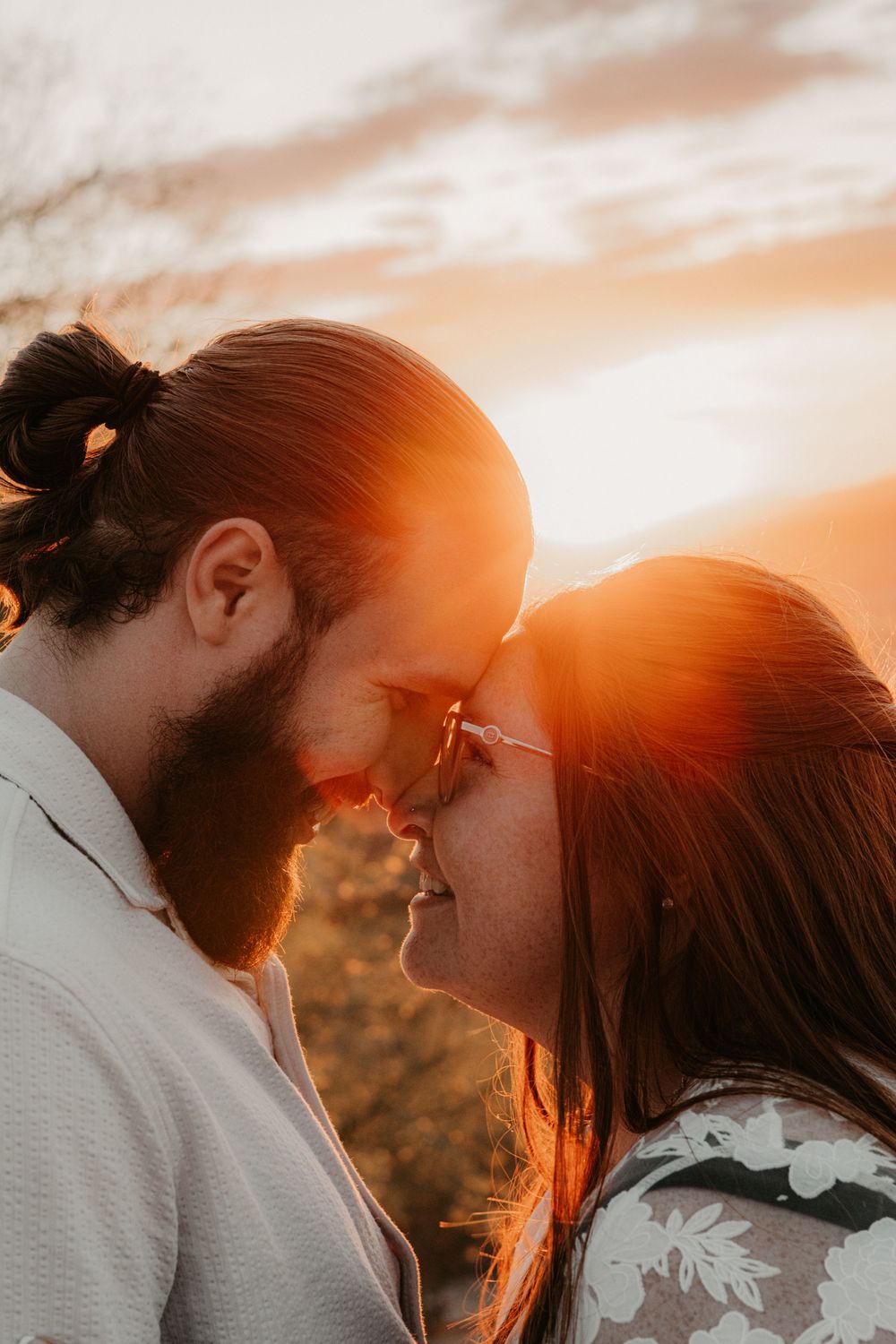 Romantic engagement photography captured in the Arizona desert during golden hour.